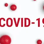 Illustration with red virus particles around the bold 'COVID-19' text, signaling the topic of the disease.
